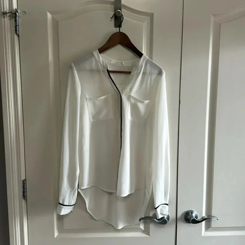 Beautiful white blouse with black detailing